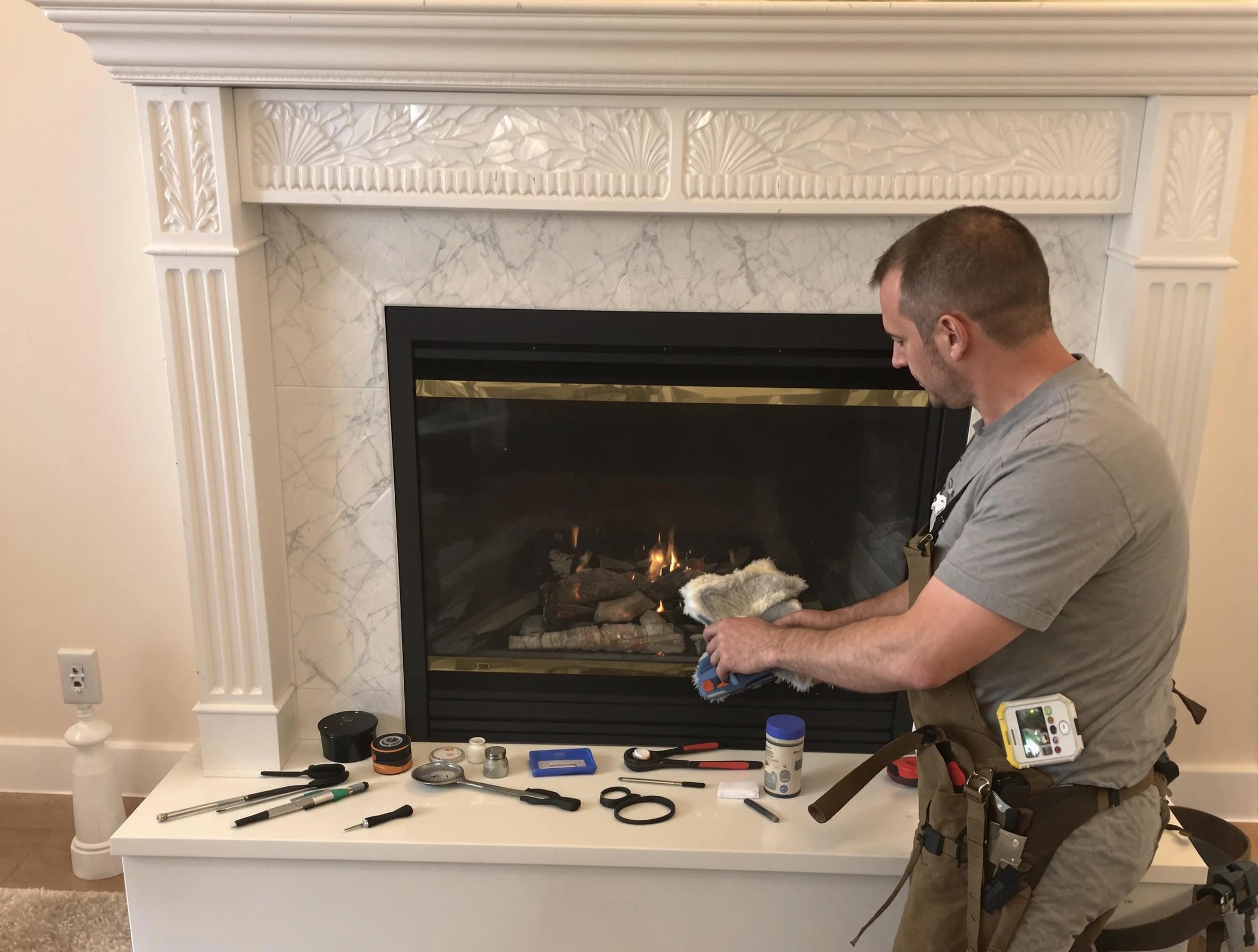 Haverhill Chimney Sweep performing fireplace maintenance in Haverhill, MA